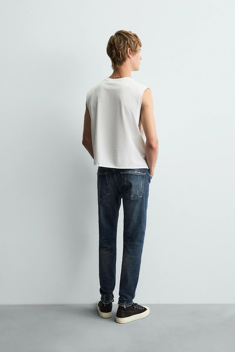 RIPPED SKINNY FIT JEANS