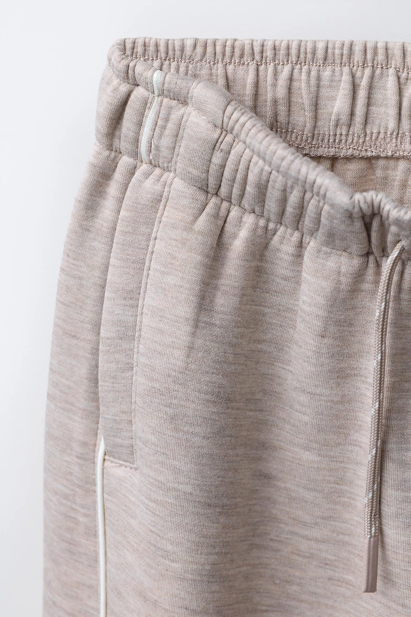 WIDE LEG GYM PANTS WITH CONTRAST PIPING