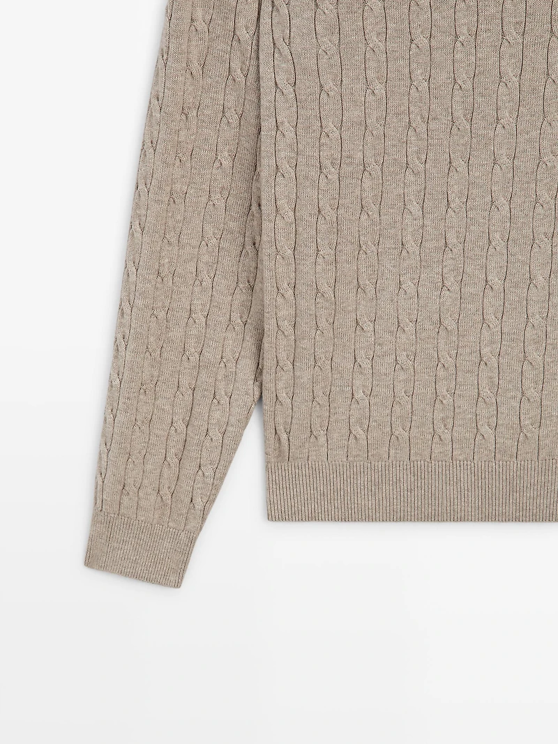 100% cotton cable-knit sweater