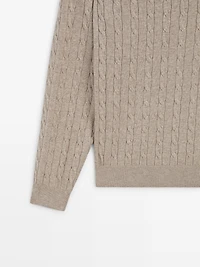100% cotton cable-knit sweater