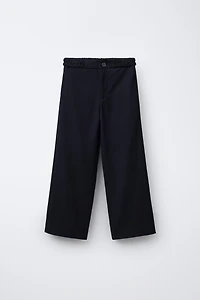 PANTALON À JAMBES LARGES AVEC DÉTAIL TRESSÉ