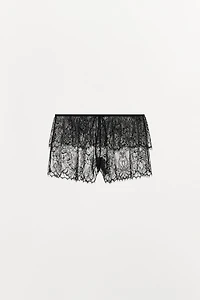 SHORT SEMI-TRANSPARENT EN DENTELLE