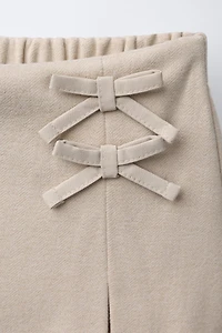 SOFT TOUCH SKORT WITH BOWS