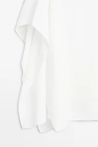 Flowing spaghetti strap top