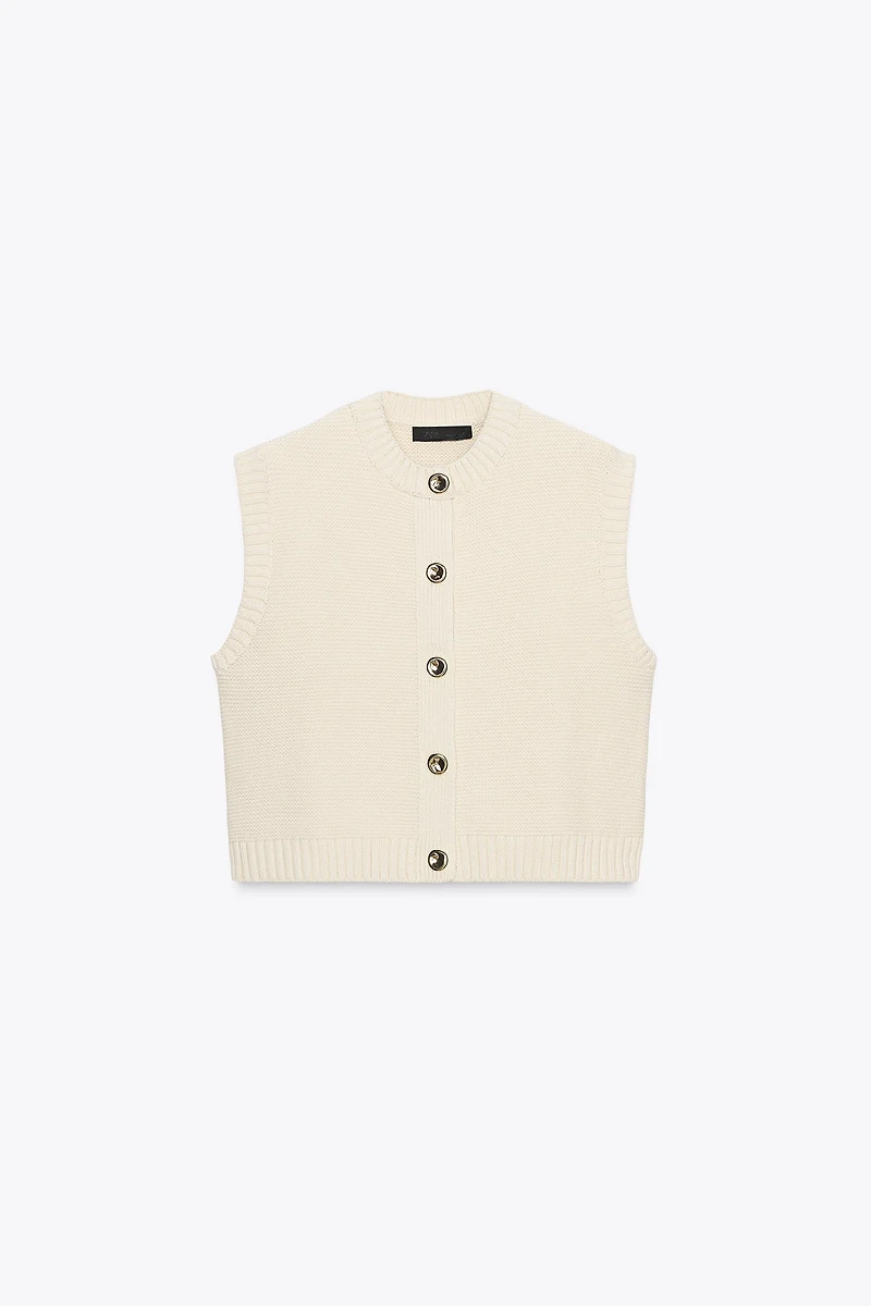 GILET EN MAILLE AVEC BOUTON DORÉ