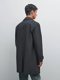 Lightweight trench coat with hidden buttons