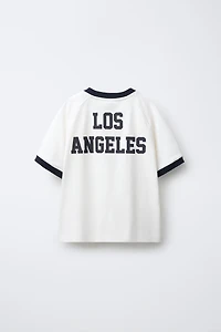 TEXT PRINT T-SHIRT WITH TRIM DETAIL