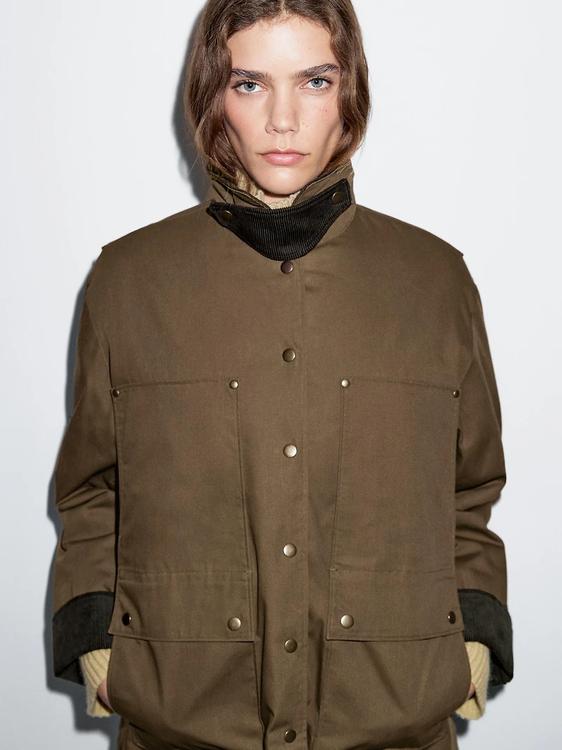 Waxed parka with corduroy detail