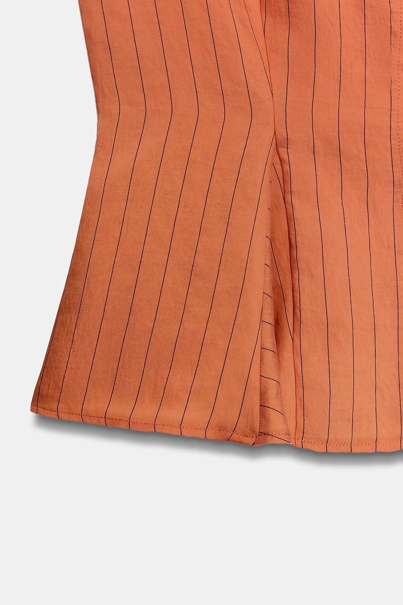 STRIPED PEPLUM VEST