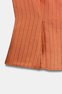 STRIPED PEPLUM VEST