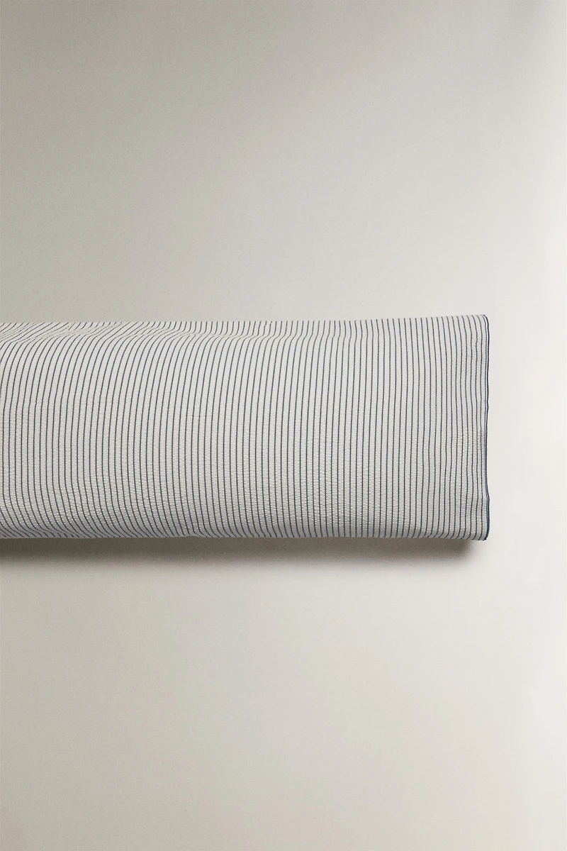 STRIPED SEERSUCKER PILLOWCASE WITH PIPING