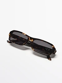 Elongated sunglasses