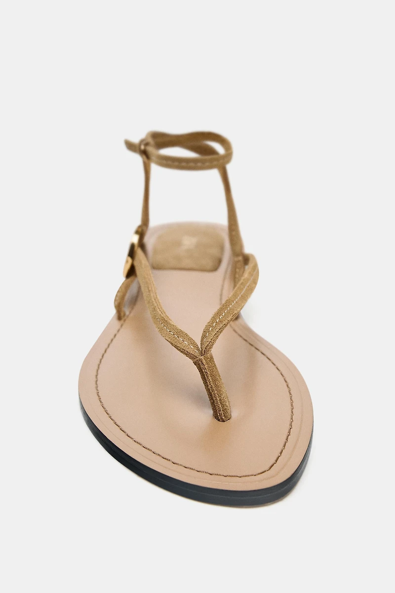 SUEDE FLAT SANDALS WITH APPLIQUÉ