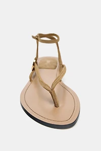 SUEDE FLAT SANDALS WITH APPLIQUÉ