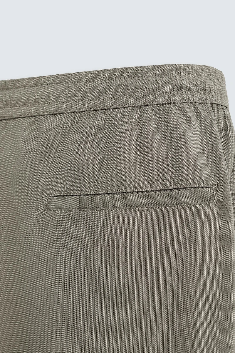 RELAXED FIT FLOWY PANTS