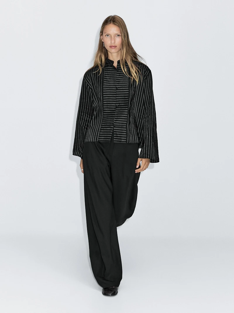 Striped shirt with stand collar and bib detail