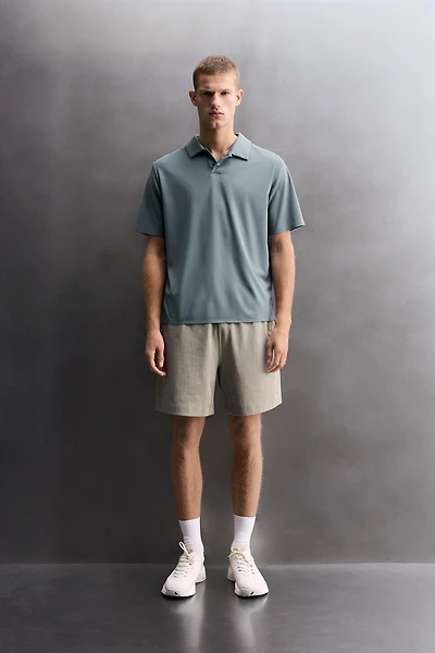 TECHNICAL PIQUÉ TRAINING POLO