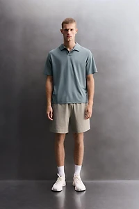 TECHNICAL PIQUÉ TRAINING POLO