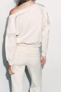 ASYMMETRIC PLUSH SWEATSHIRT