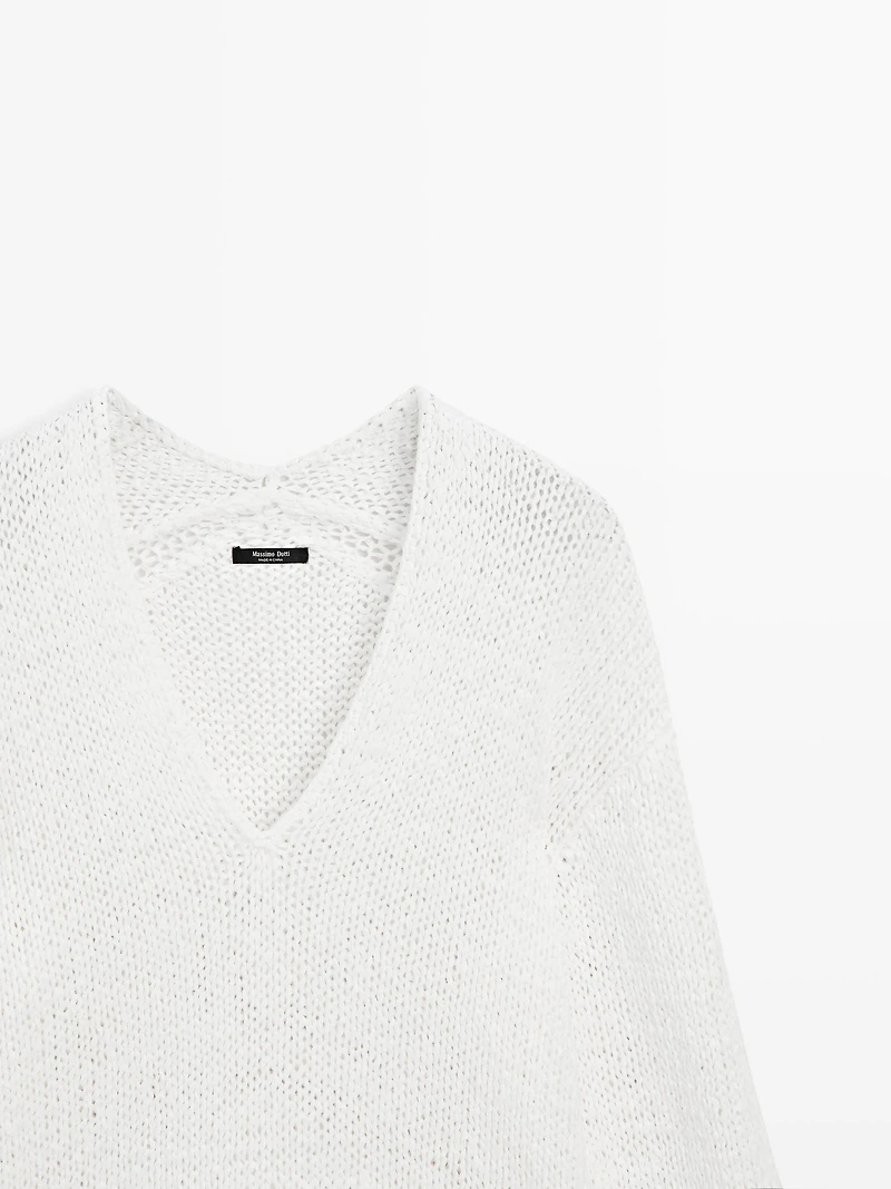 Pull maille ajourée col en V