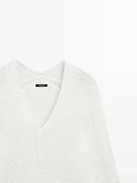 Pull maille ajourée col en V