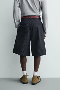 PINSTRIPED PLEATED SHORTS
