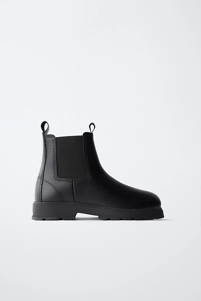 TREADED ANKLE BOOTS