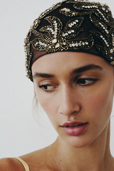 CASQUETTE EN TULLE AVEC FANTAISIE