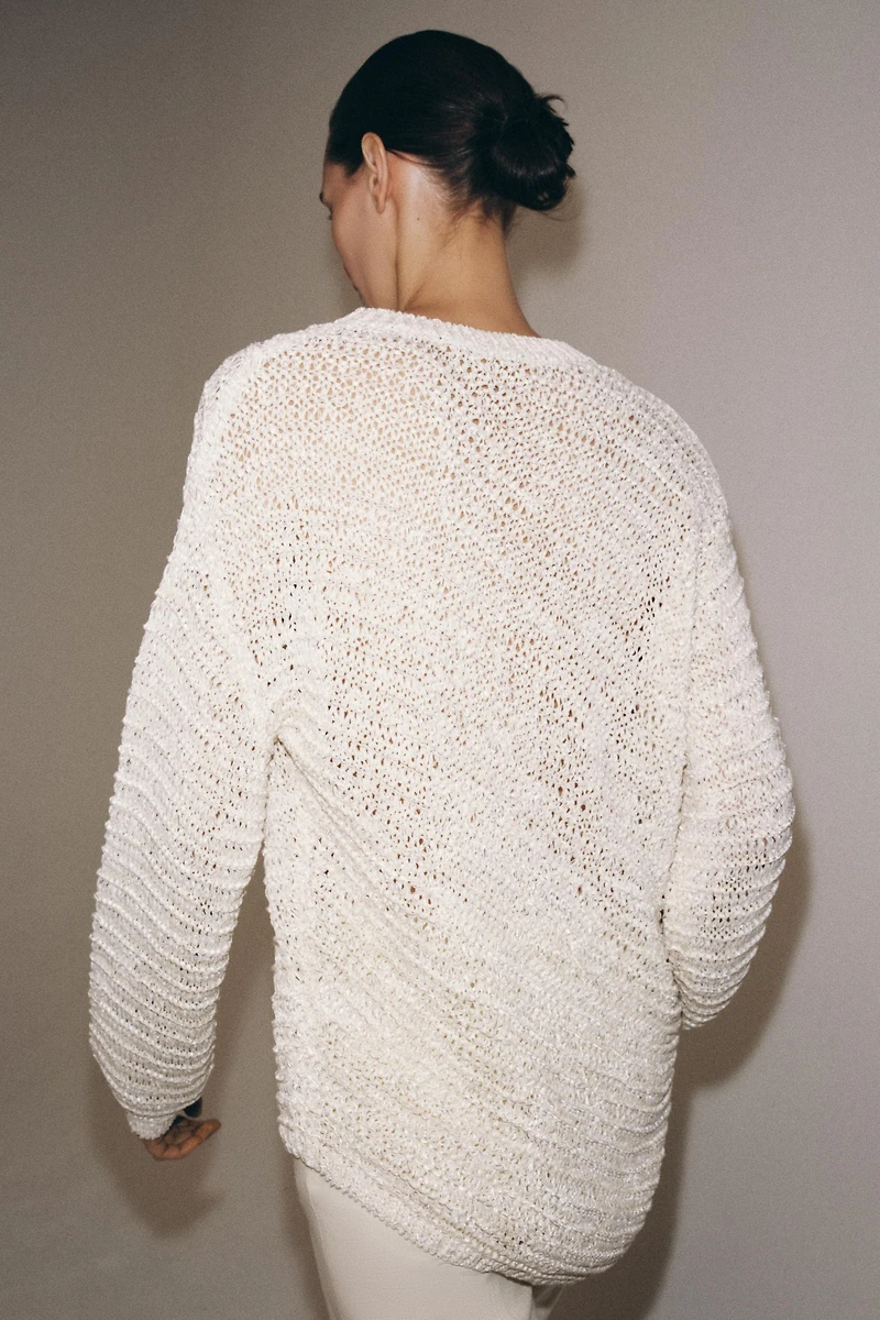 OVERSIZED ASYMMETRIC HEM JUMPER