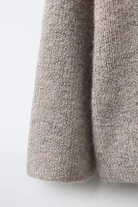 PULL EN MAILLE À COL TUNISIEN