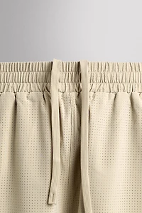 COMBINED PERFORATED SHORTS