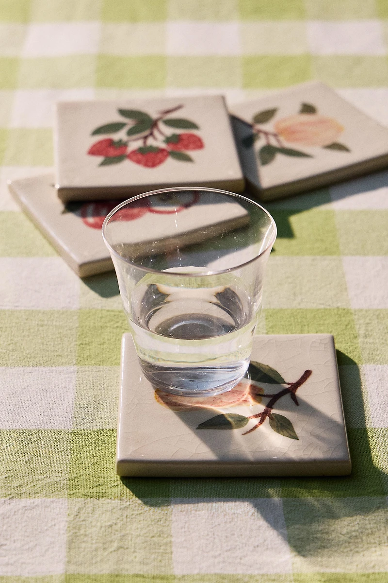 LOT DE 4 DESSOUS DE VERRE EN GRÈS MOTIF FRUITS
