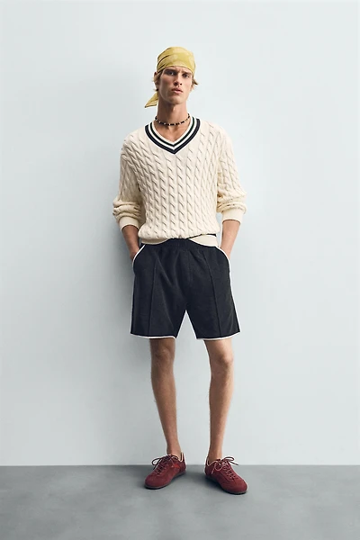 CABLE KNIT SWEATER