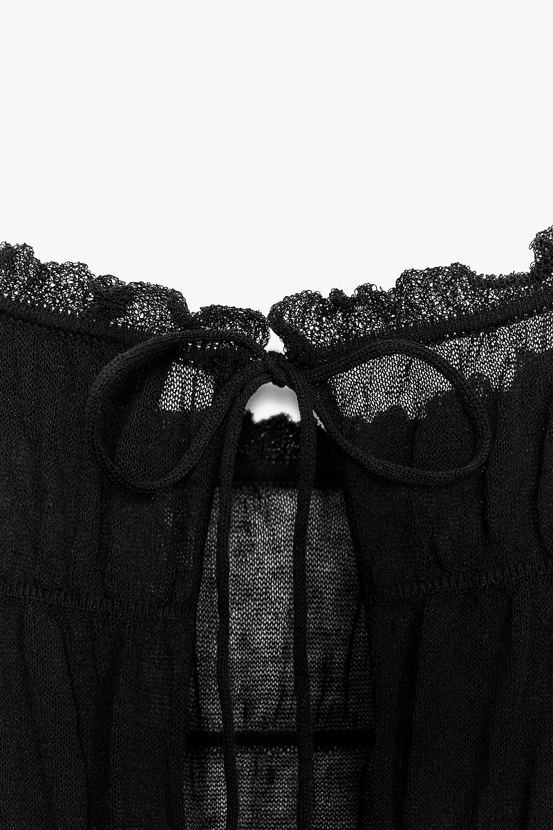 RUCHED SEMI-SHEER KNIT TOP
