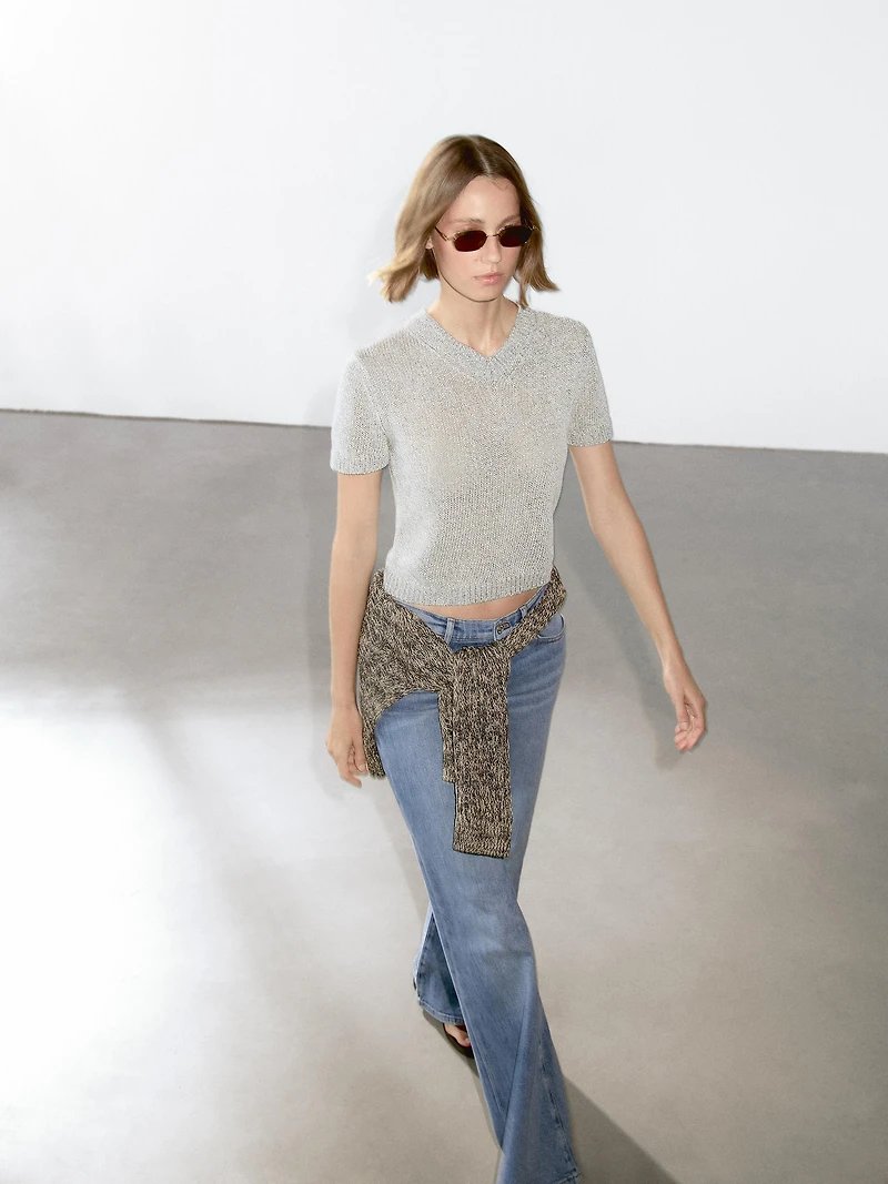 Knit sweater with fabric detail