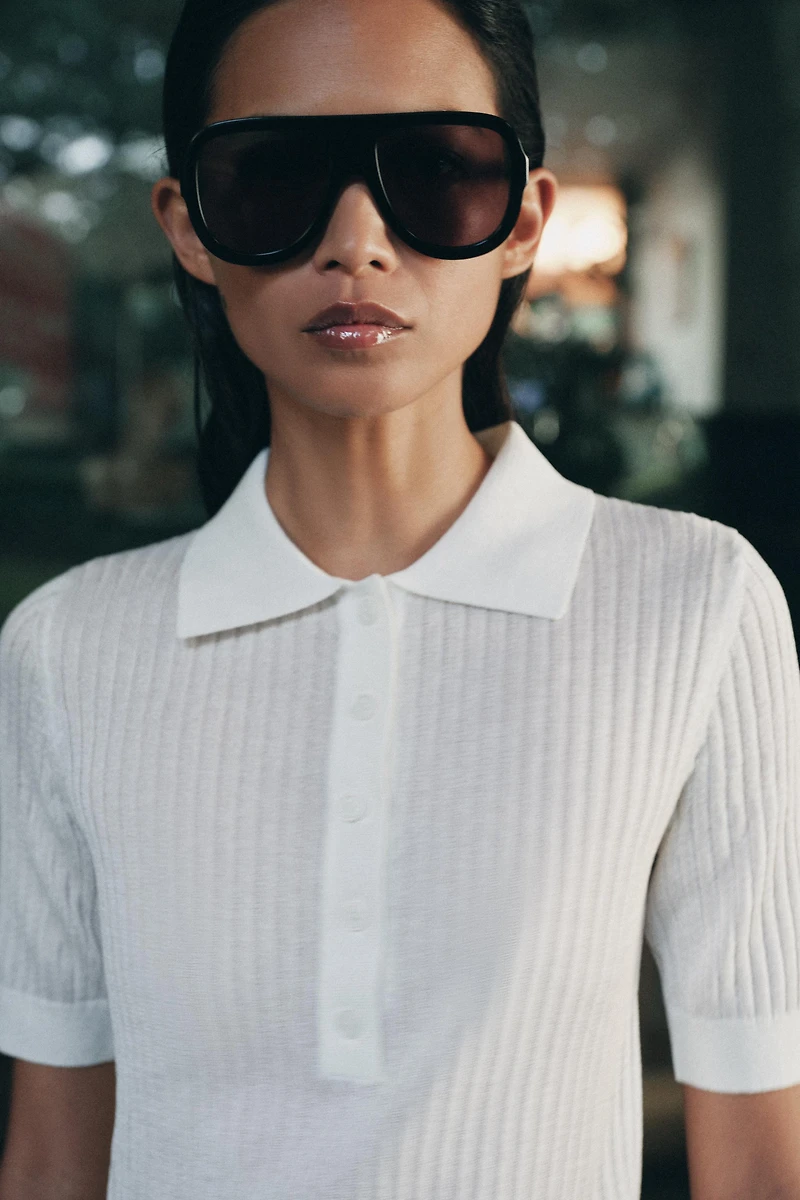 POLO EN MAILLE SEMI-TRANSPARENTE