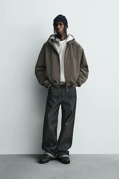 LIGHTWEIGHT HOODED TECHNICAL JACKET