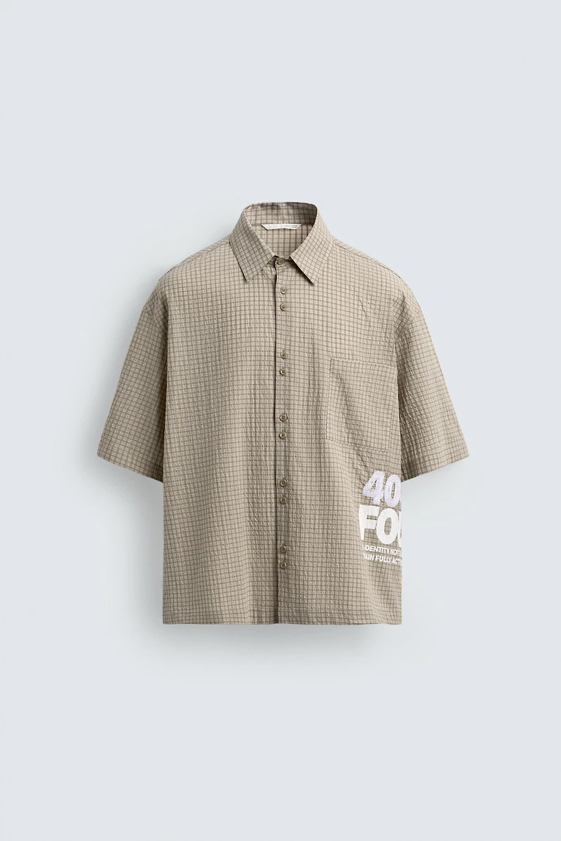 PLAID SHIRT WITH PRINTED TEXT