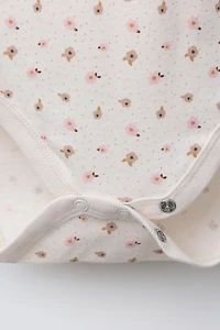 LOT DE CINQ BODYS À FLEURS