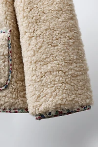 FLEECE JACKET WITH FLORAL TRIM