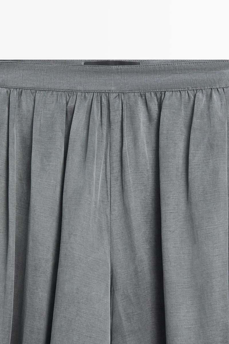 Pantalon balloon plissé en lin mélangé