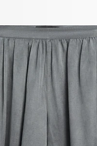 Pantalon balloon plissé en lin mélangé