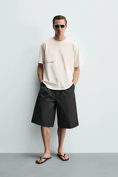 CONTRASTING PATCH TEXT T-SHIRT