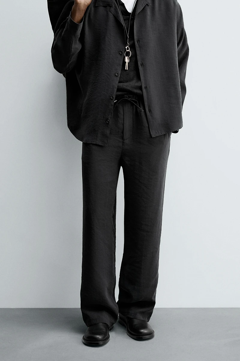 RELAXED FIT FLOWY PANTS