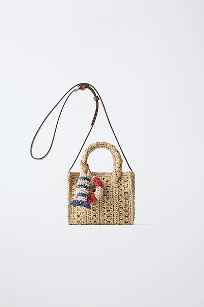 RAFFIA CROSSBODY BAG WITH MARINE CHARMS