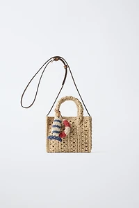 RAFFIA CROSSBODY BAG WITH MARINE CHARMS