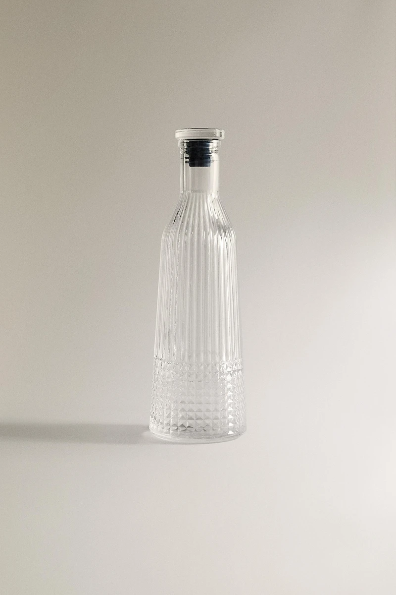 RAISED DESIGN GLASS BOTTLE
