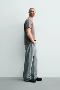 T-SHIRT EN MAILLE LAVÉE À PIÈCES