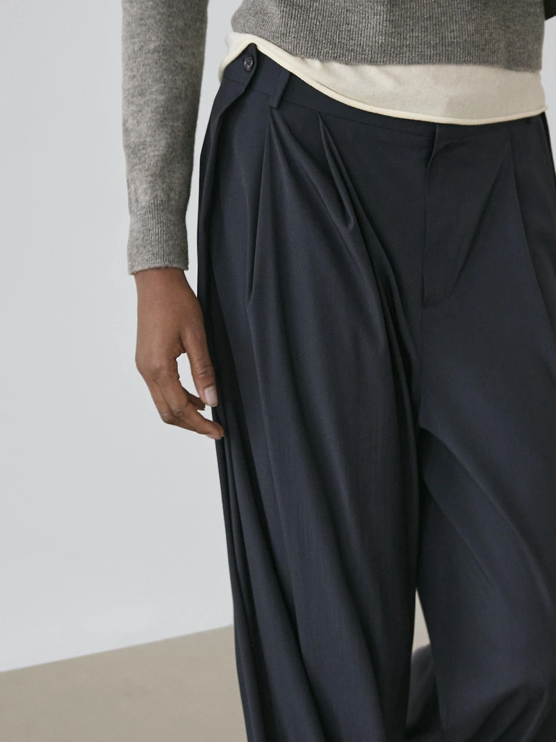 Pleated wool blend trousers
