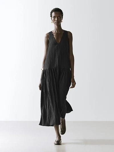 Flowing pleated midi dress